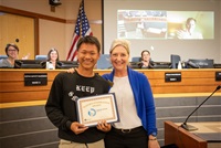 Thnih Tran with Mayor Wendi Strom